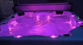 Hot tub with purple lights