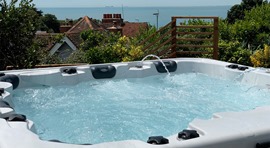 Hot tub with pop-up fountains