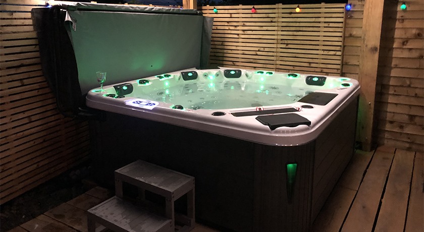 Green hot tub water